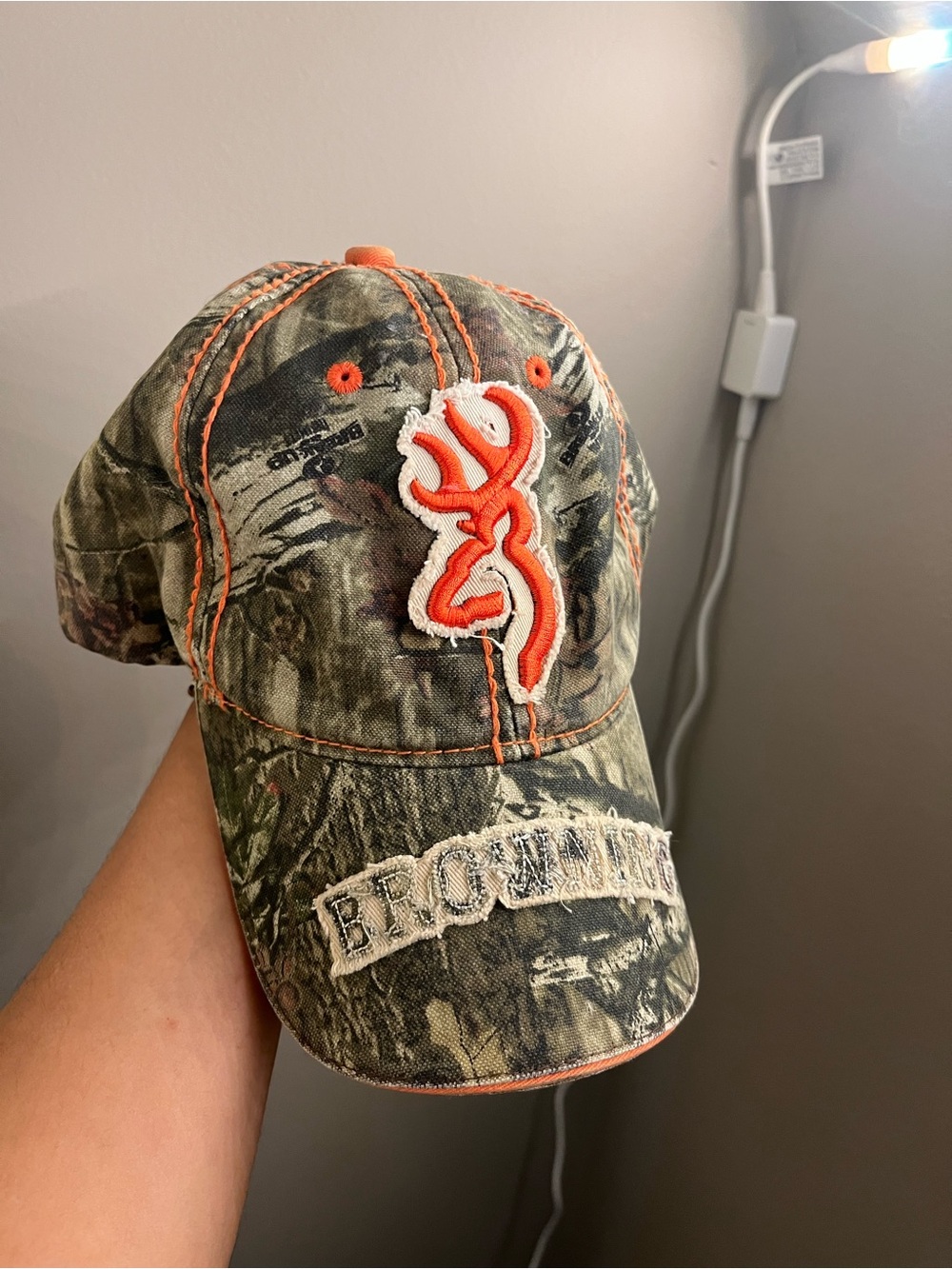 Browning Camo Baseball Hat with Bright Orange Logo